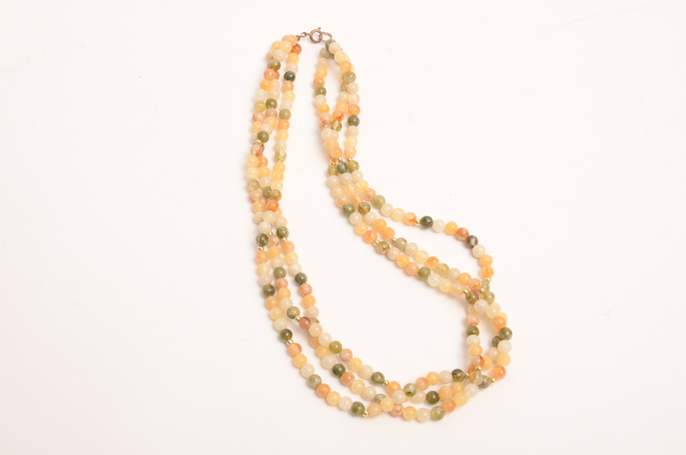 Collection of Carved Stone and Glass Bead Necklaces