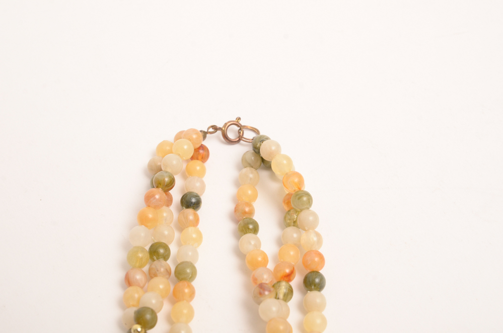 Collection of Carved Stone and Glass Bead Necklaces