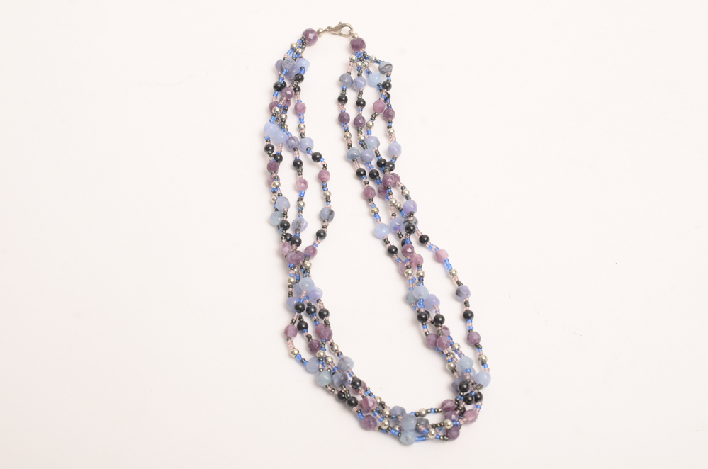 Collection of Carved Stone and Glass Bead Necklaces