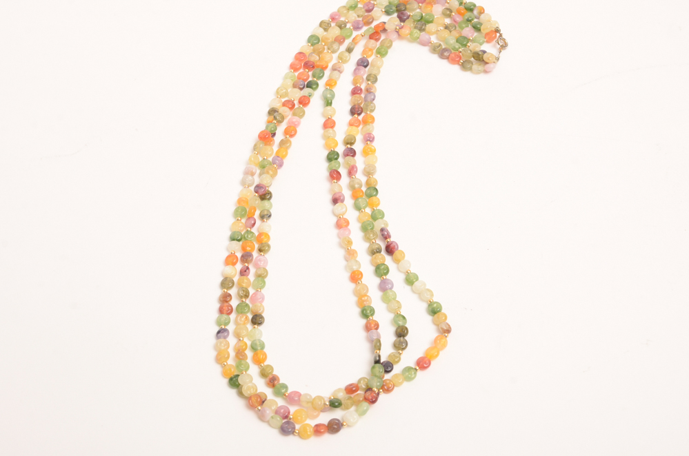Collection of Carved Stone and Glass Bead Necklaces