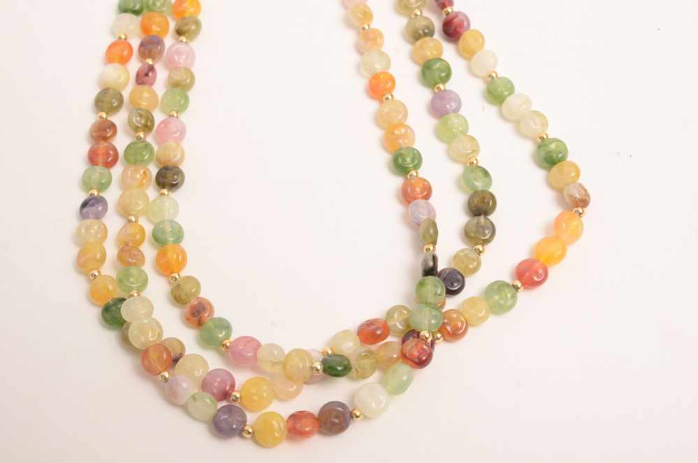Collection of Carved Stone and Glass Bead Necklaces