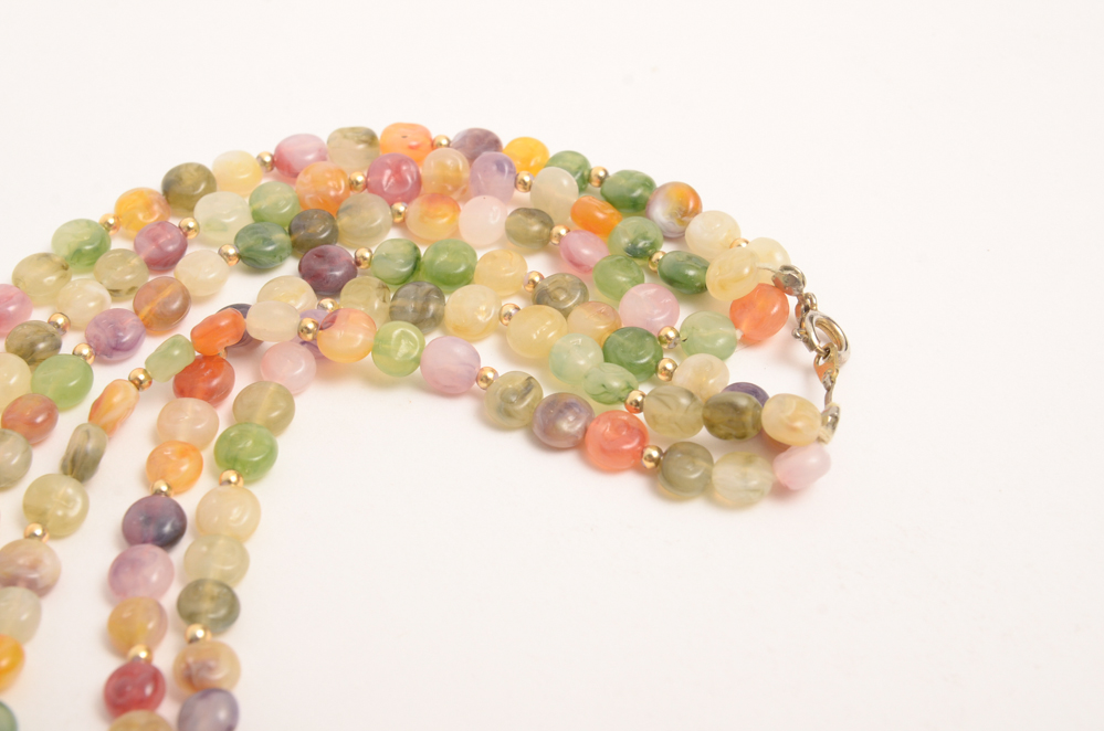 Collection of Carved Stone and Glass Bead Necklaces