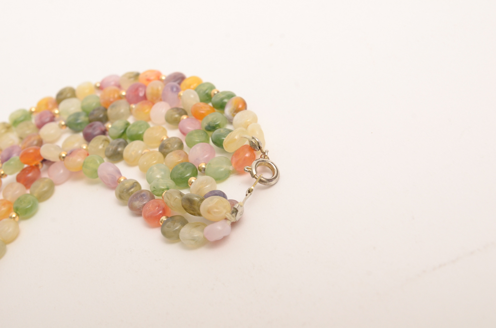 Collection of Carved Stone and Glass Bead Necklaces