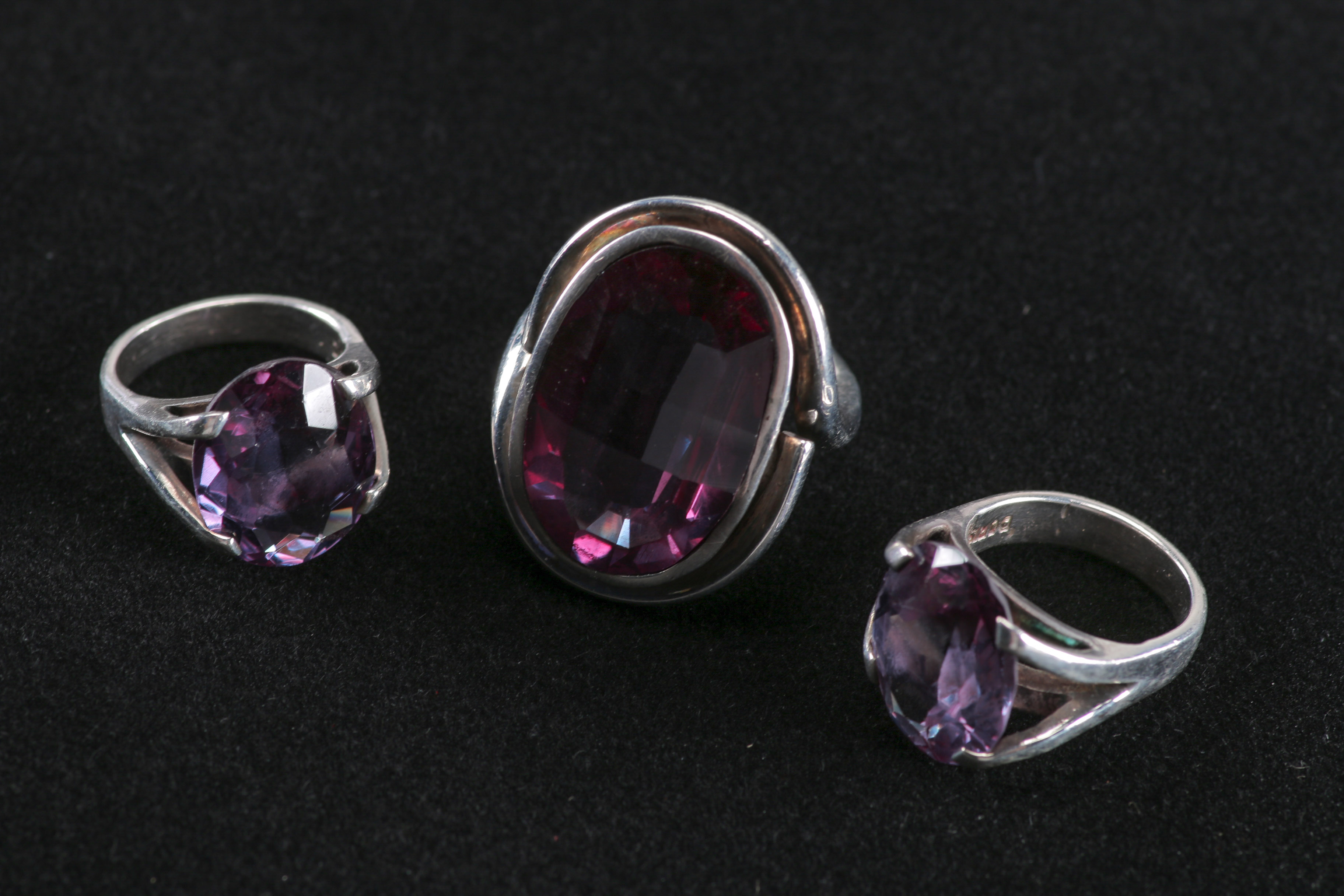 Assortment of 900 Silver and Color Change Sapphire Rings