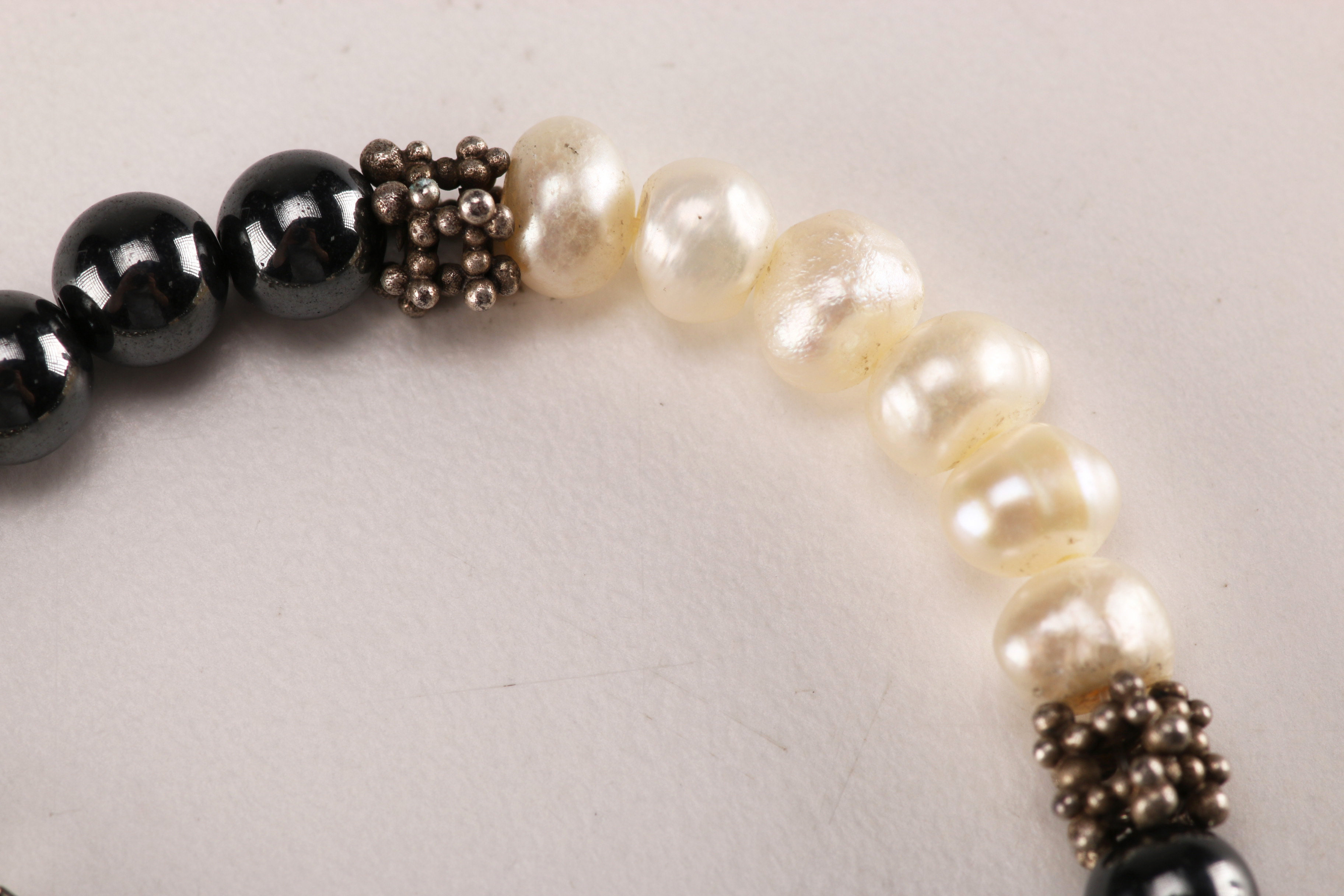 Collection of Bracelets with Pearl Like Beads