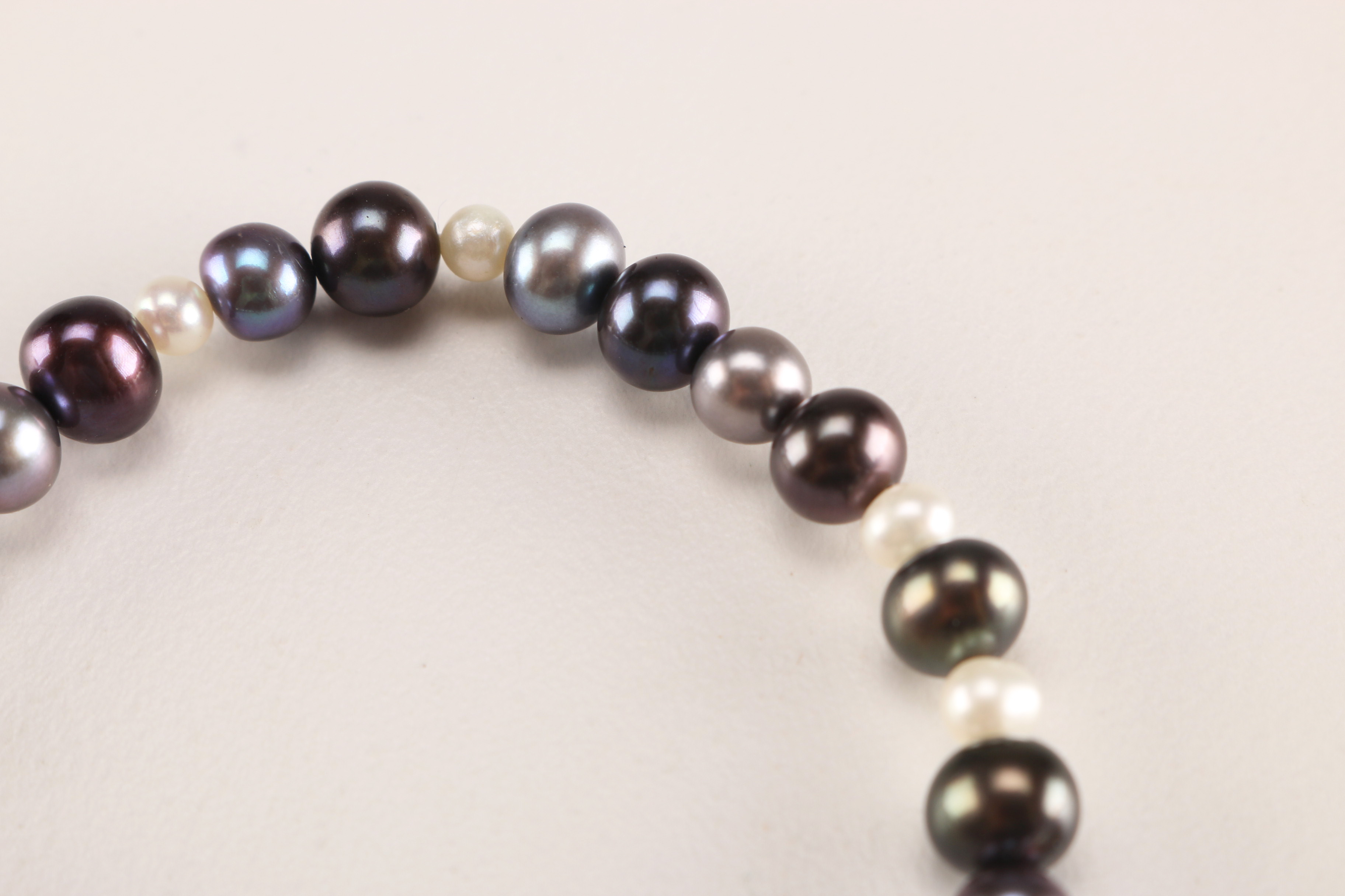 Collection of Bracelets with Pearl Like Beads