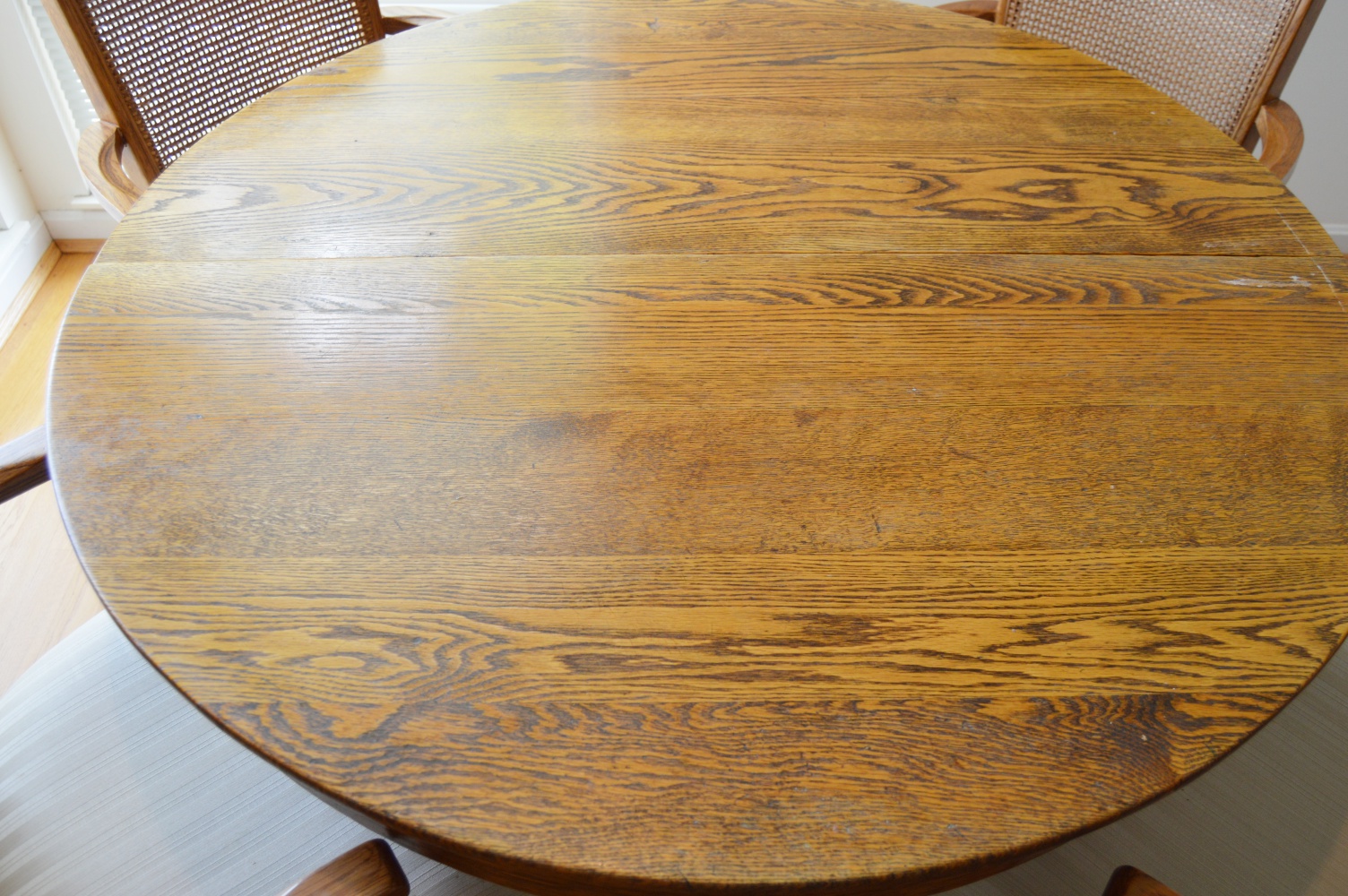 Round Oak Table and Four Oak Chairs