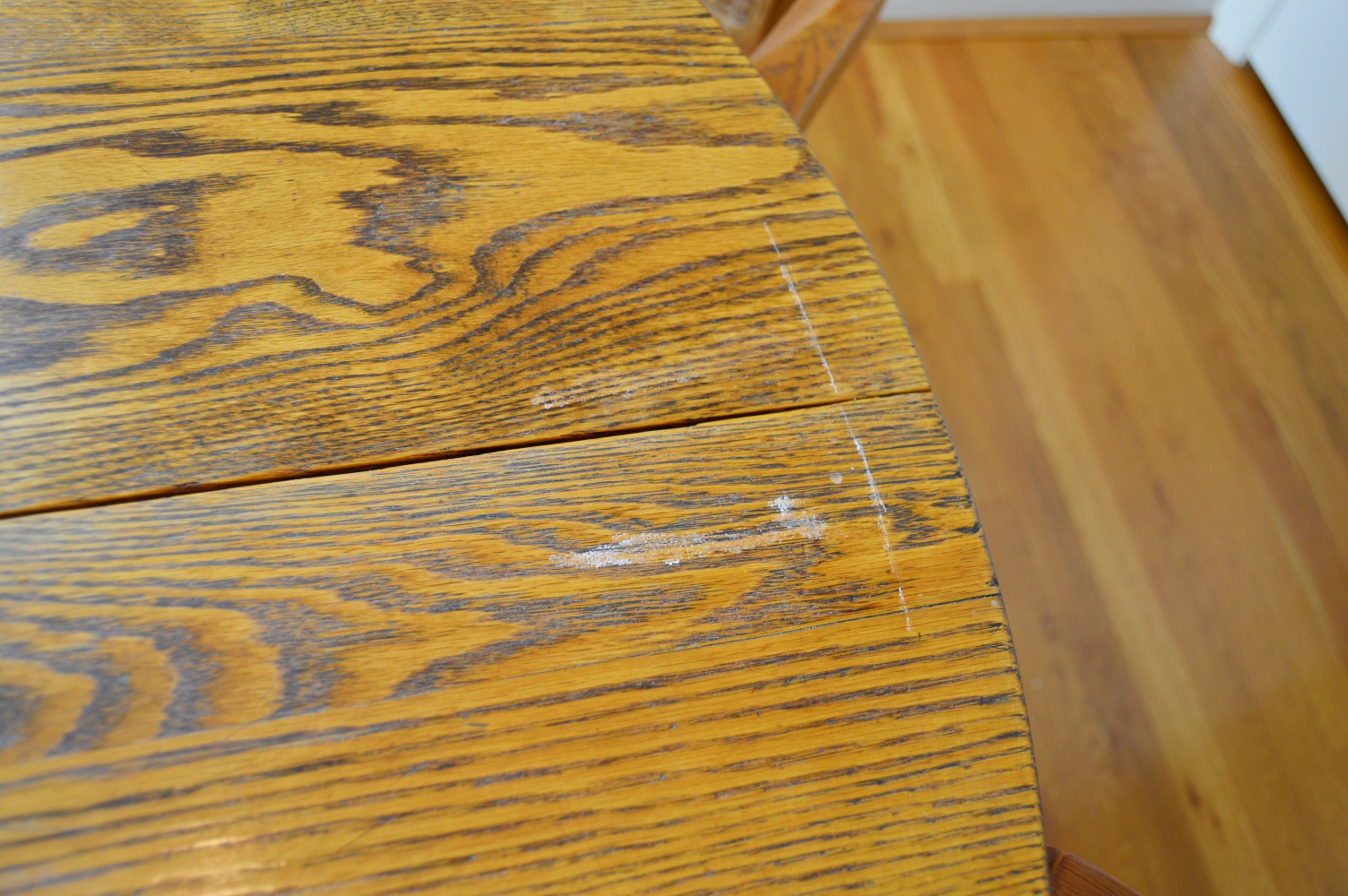 Round Oak Table and Four Oak Chairs