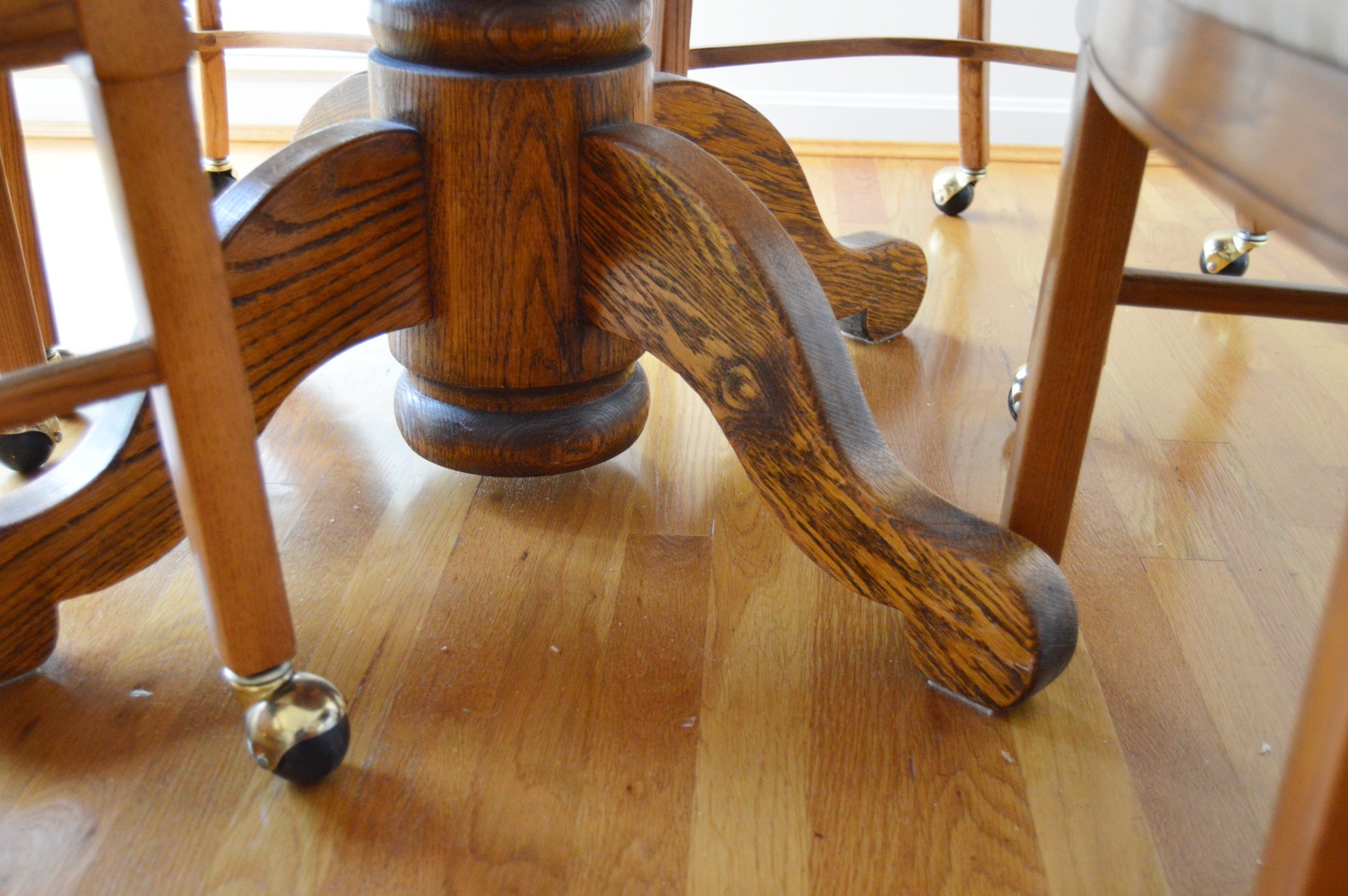 Round Oak Table and Four Oak Chairs
