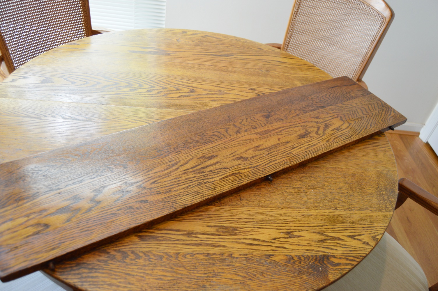 Round Oak Table and Four Oak Chairs