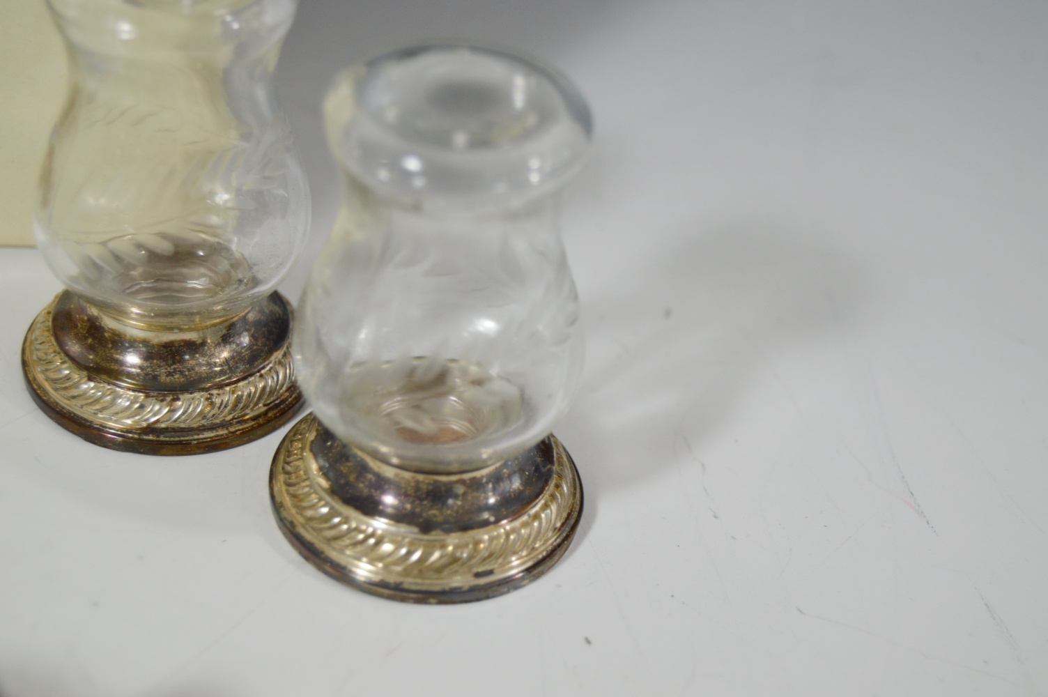 Three Pairs of Salt and Pepper Shakers Including Sterling Silver