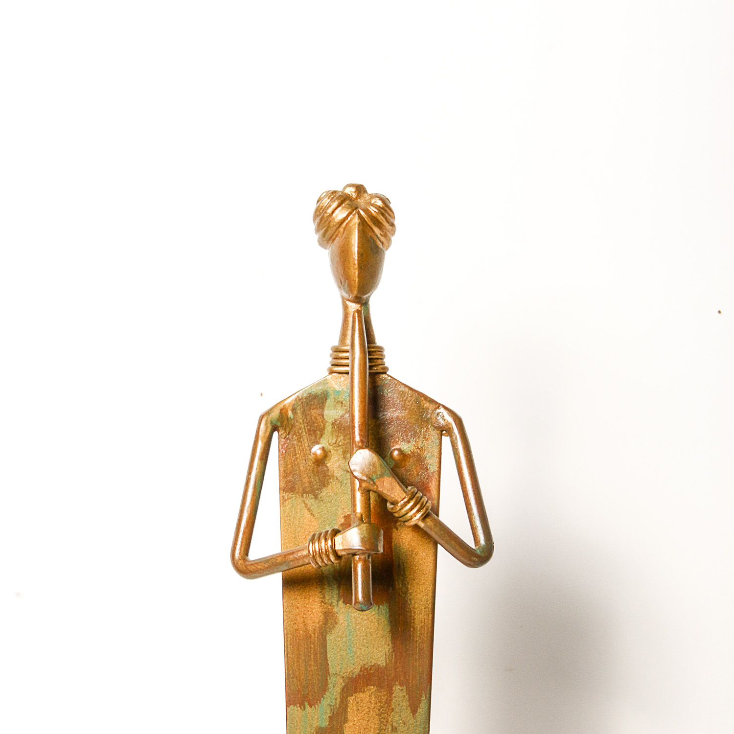 Flute Player Sculpture