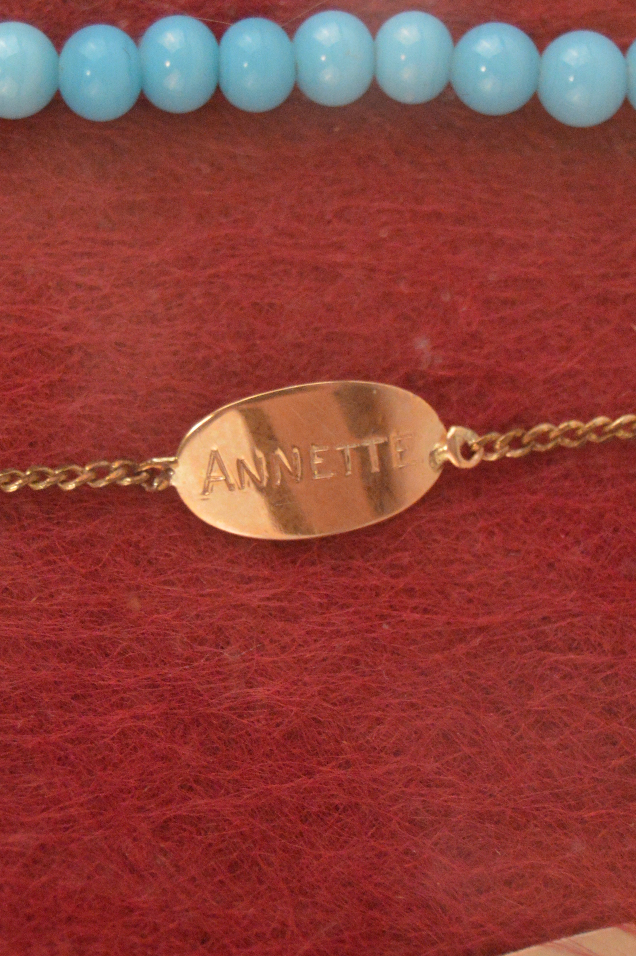 Framed Presentation of Annette Dionne Reproduction Baby Jewelry