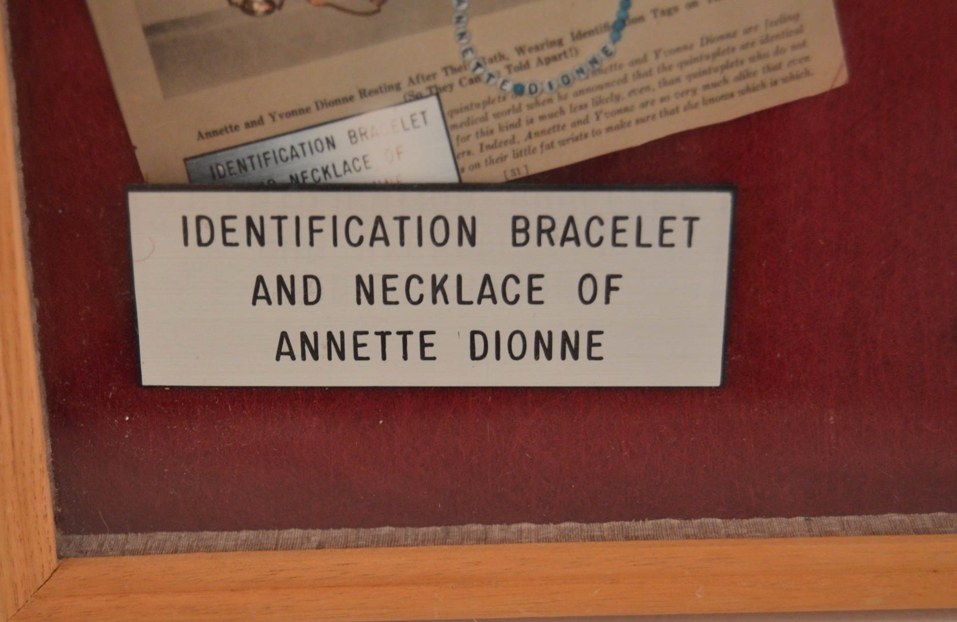 Framed Presentation of Annette Dionne Reproduction Baby Jewelry