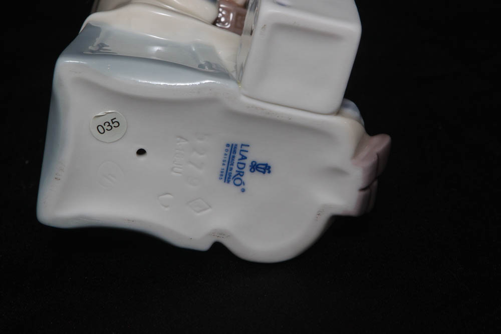 Lladro Clown Collectibles including "Tired Friend" and "Pierrot with Concertina"