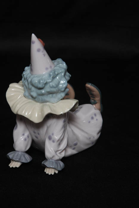 Lladro Clown Collectibles including "Tired Friend" and "Pierrot with Concertina"