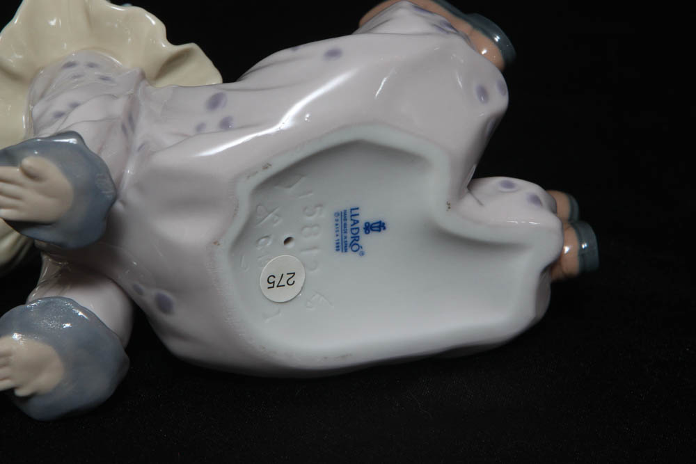 Lladro Clown Collectibles including "Tired Friend" and "Pierrot with Concertina"