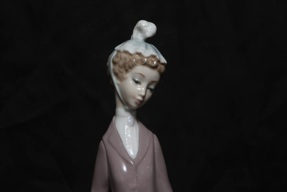 Lladro “Lady with Dog & Umbrella” Retired Figurine