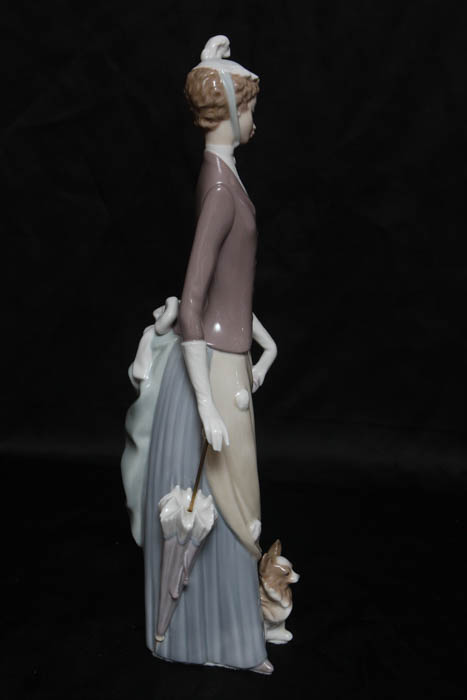 Lladro “Lady with Dog & Umbrella” Retired Figurine