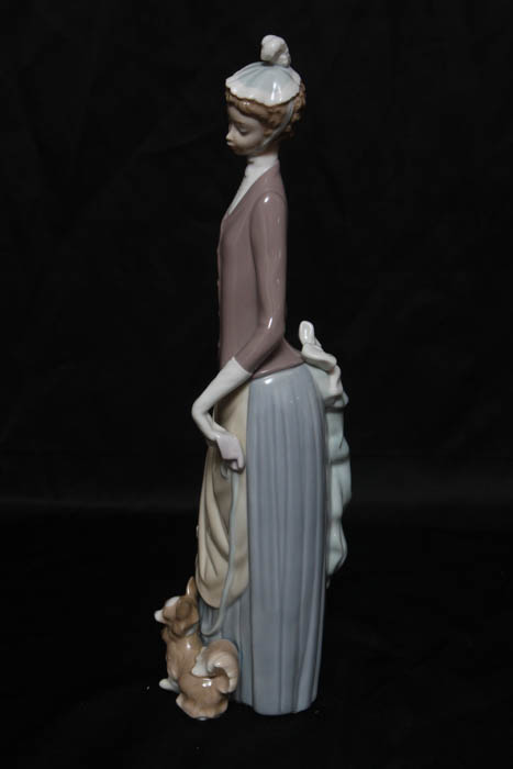 Lladro “Lady with Dog & Umbrella” Retired Figurine