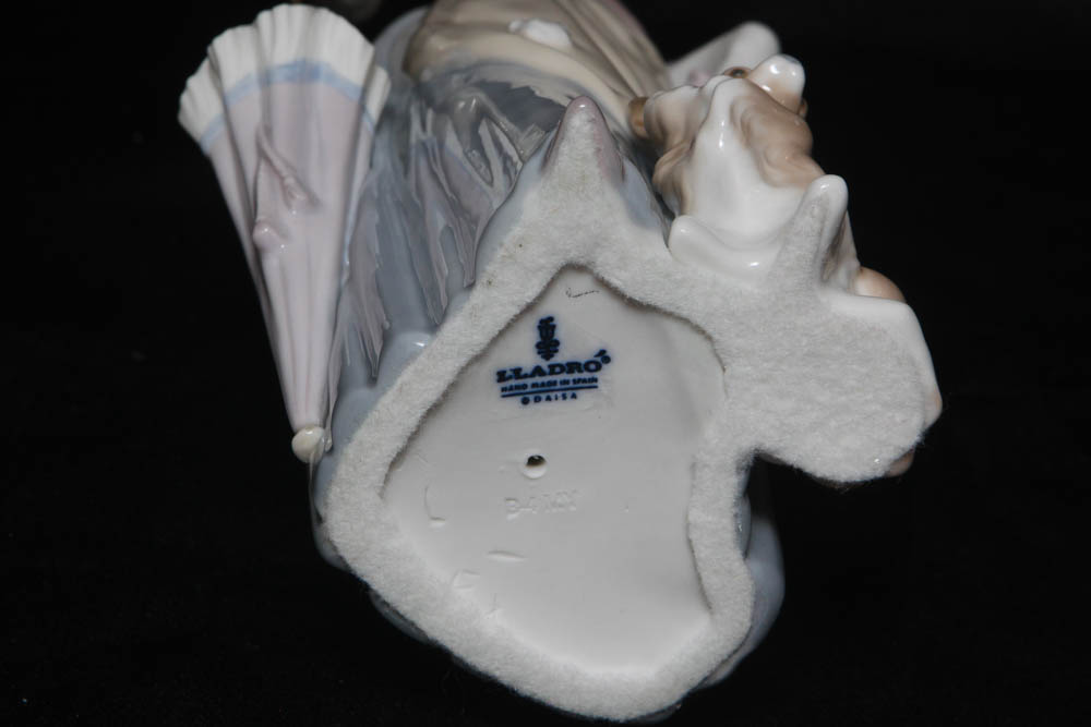 Lladro “Lady with Dog & Umbrella” Retired Figurine