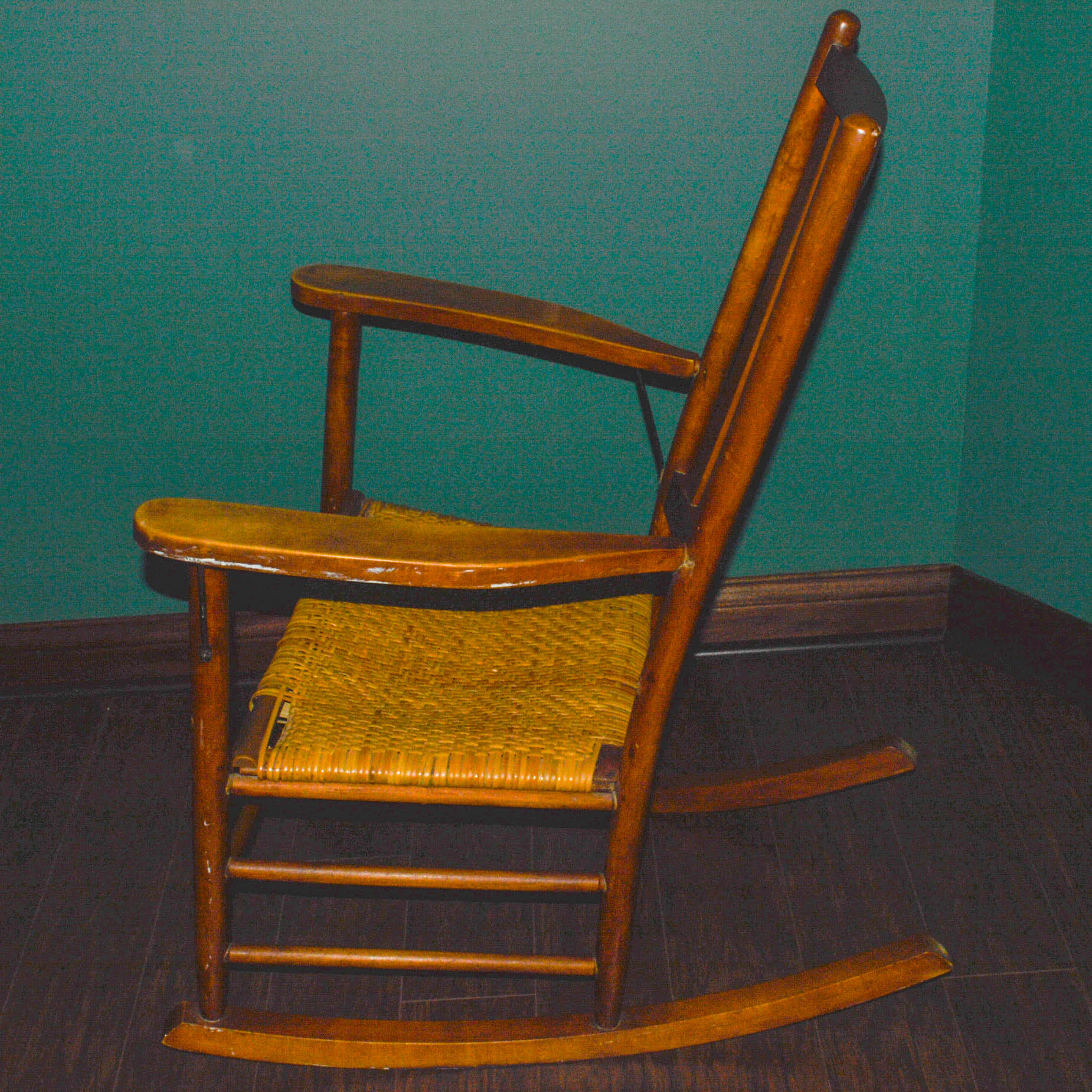 Antique Rocking Chair with Woven Seat