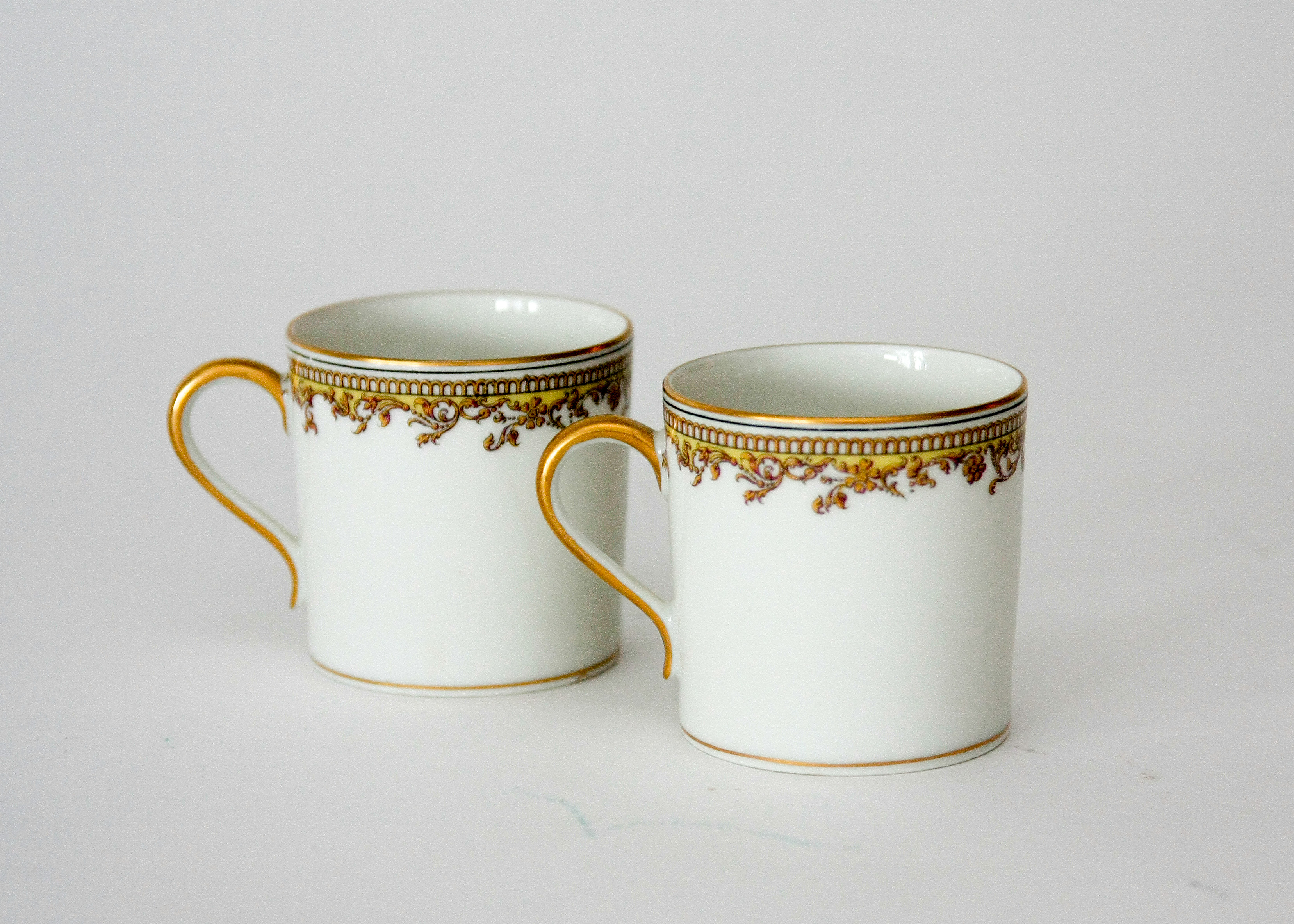 Assortment of Cups with a Cream and Sugar Set featuring Haviland