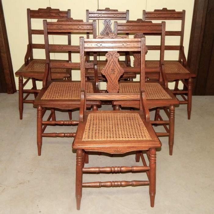 Six Eastlake Victorian Carved Cane Seat Chairs