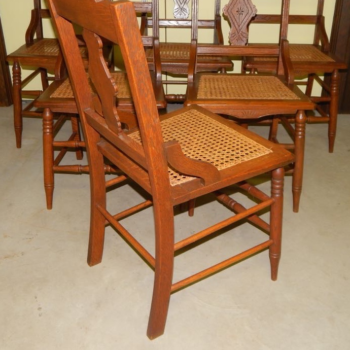 Six Eastlake Victorian Carved Cane Seat Chairs