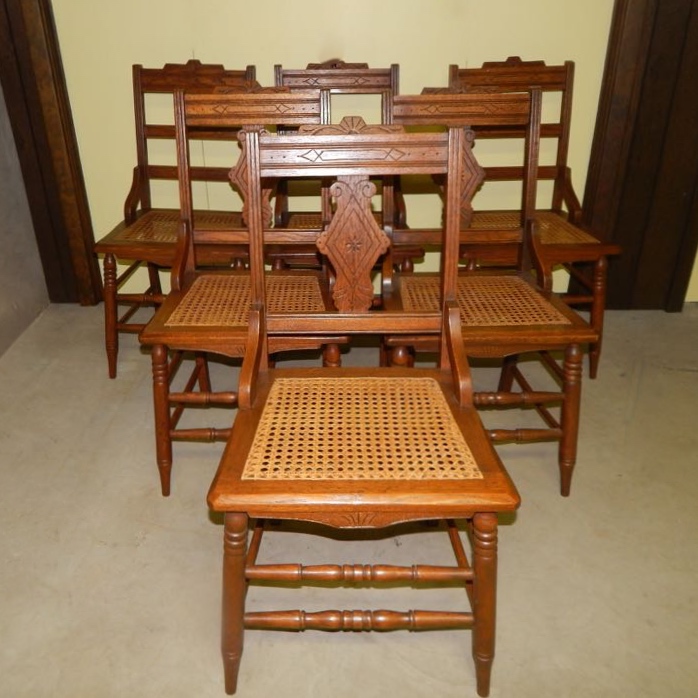 Six Eastlake Victorian Carved Cane Seat Chairs