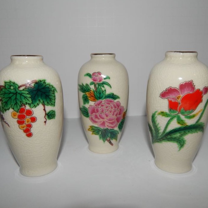 Nippon Porcelain Salt Cellars and Three Homco Bud Vases