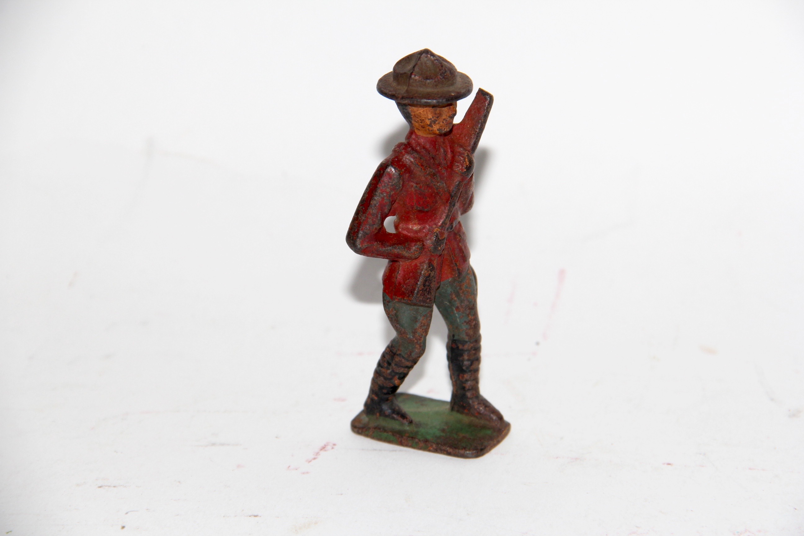 Four Vintage Metal Toy Soldiers