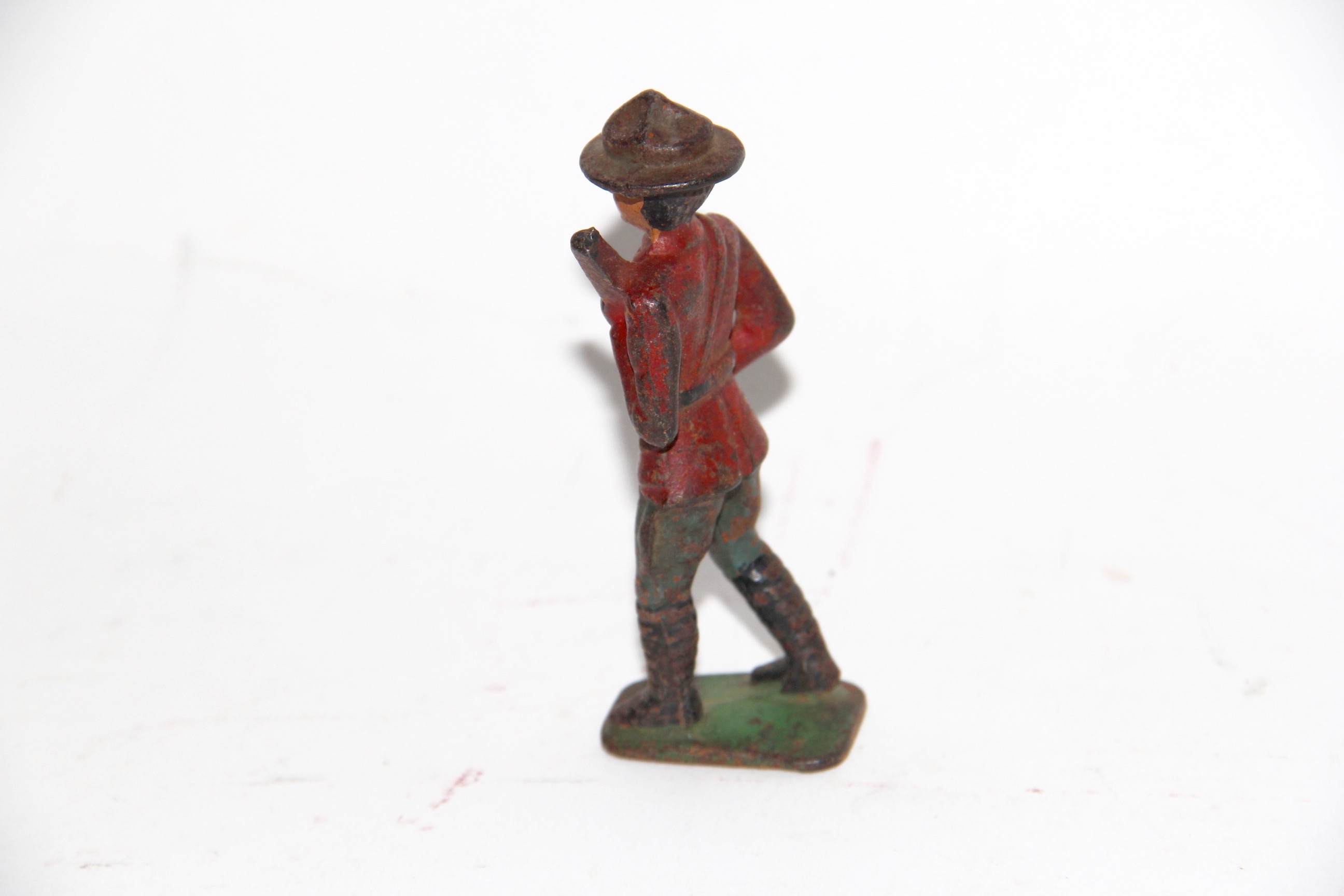 Four Vintage Metal Toy Soldiers