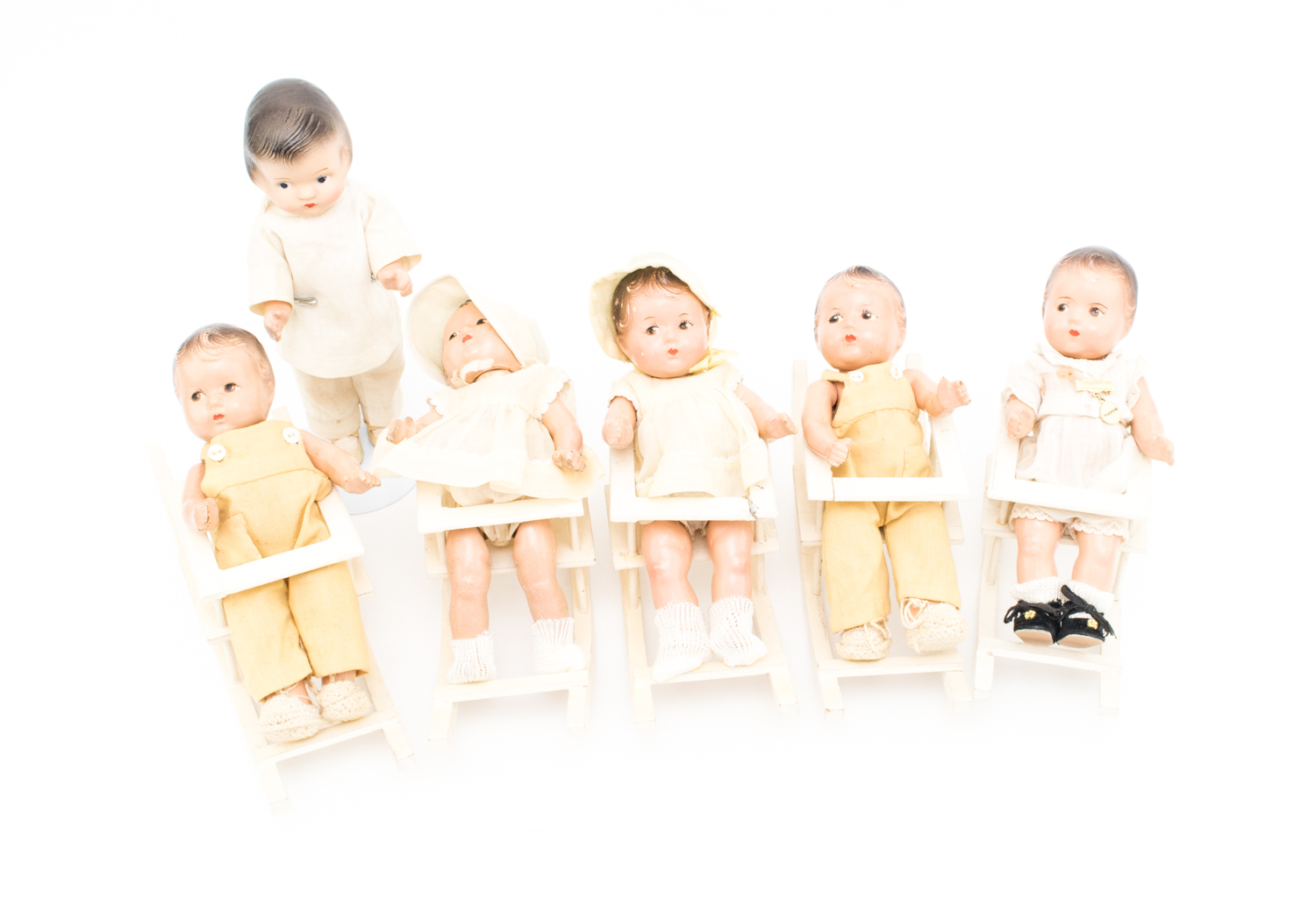 1930s Madame Alexander Dionne Quints Composition Dolls and Dr. Dafoe Doll with Five Wooden Rockers