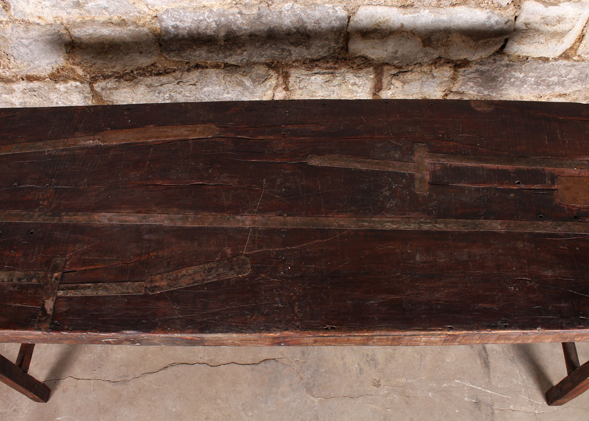 Reclaimed Wood Paneled Dining Table with Metal Strapping