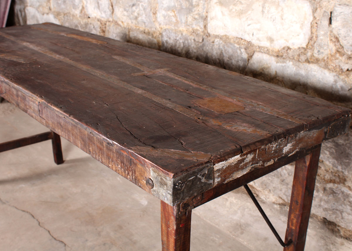 Reclaimed Wood Paneled Dining Table with Metal Strapping