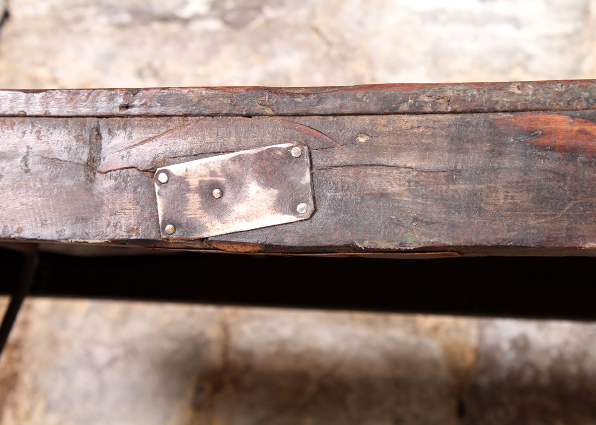 Reclaimed Wood Paneled Dining Table with Metal Strapping