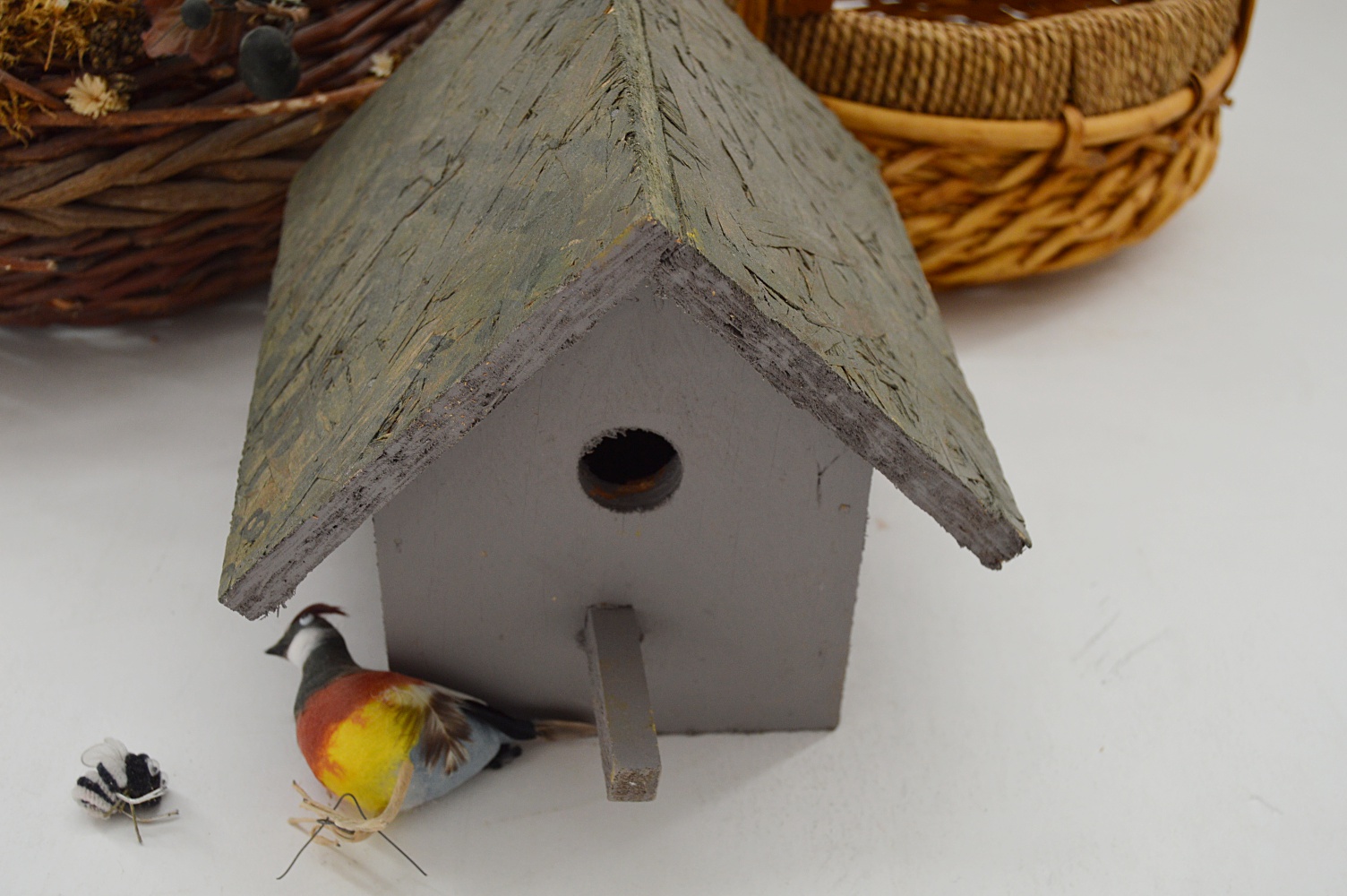 Baskets and Wooden Bird House