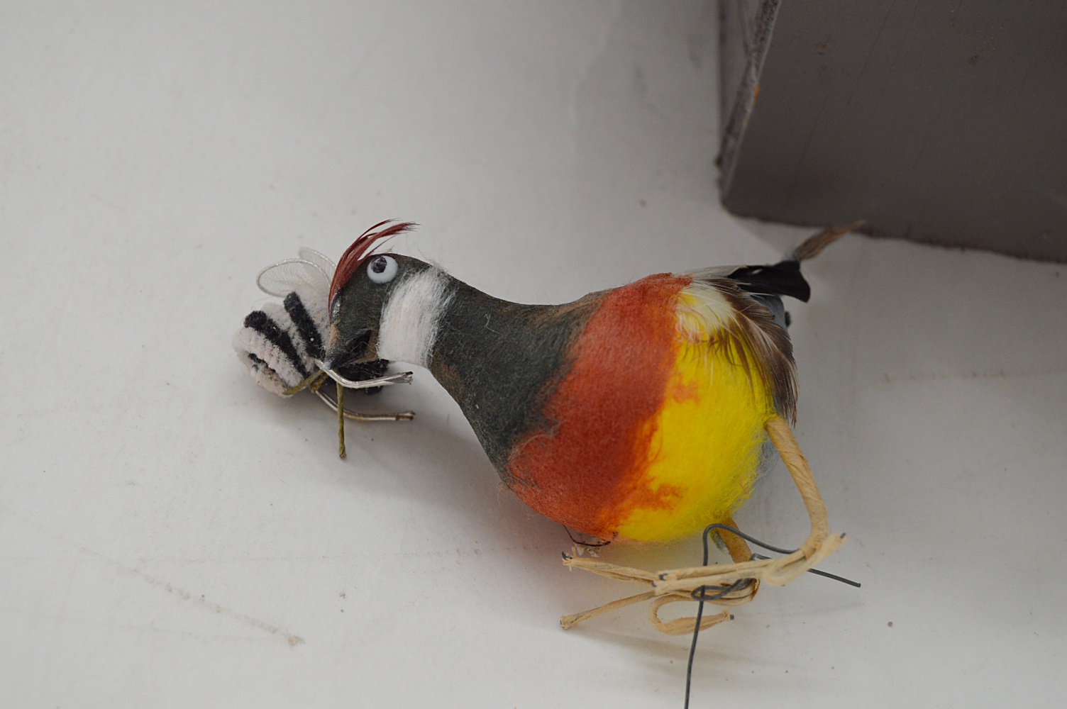 Baskets and Wooden Bird House