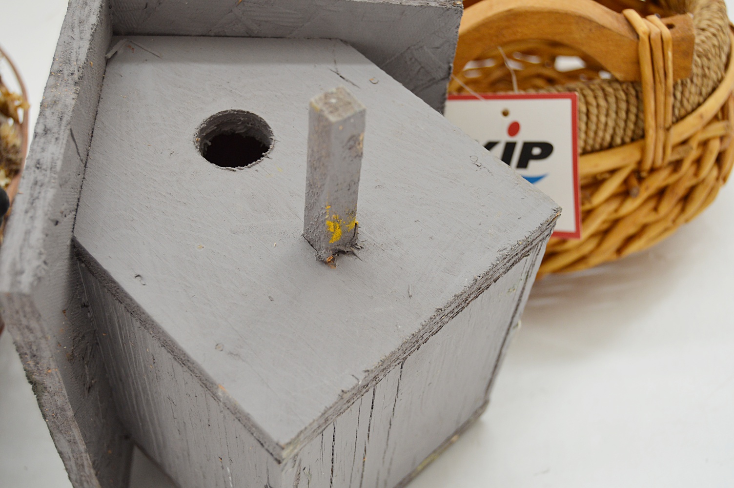 Baskets and Wooden Bird House