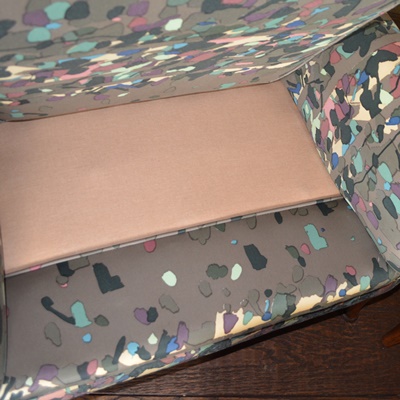 Pair of Gray Confetti Upholstered Armchairs and Ottoman