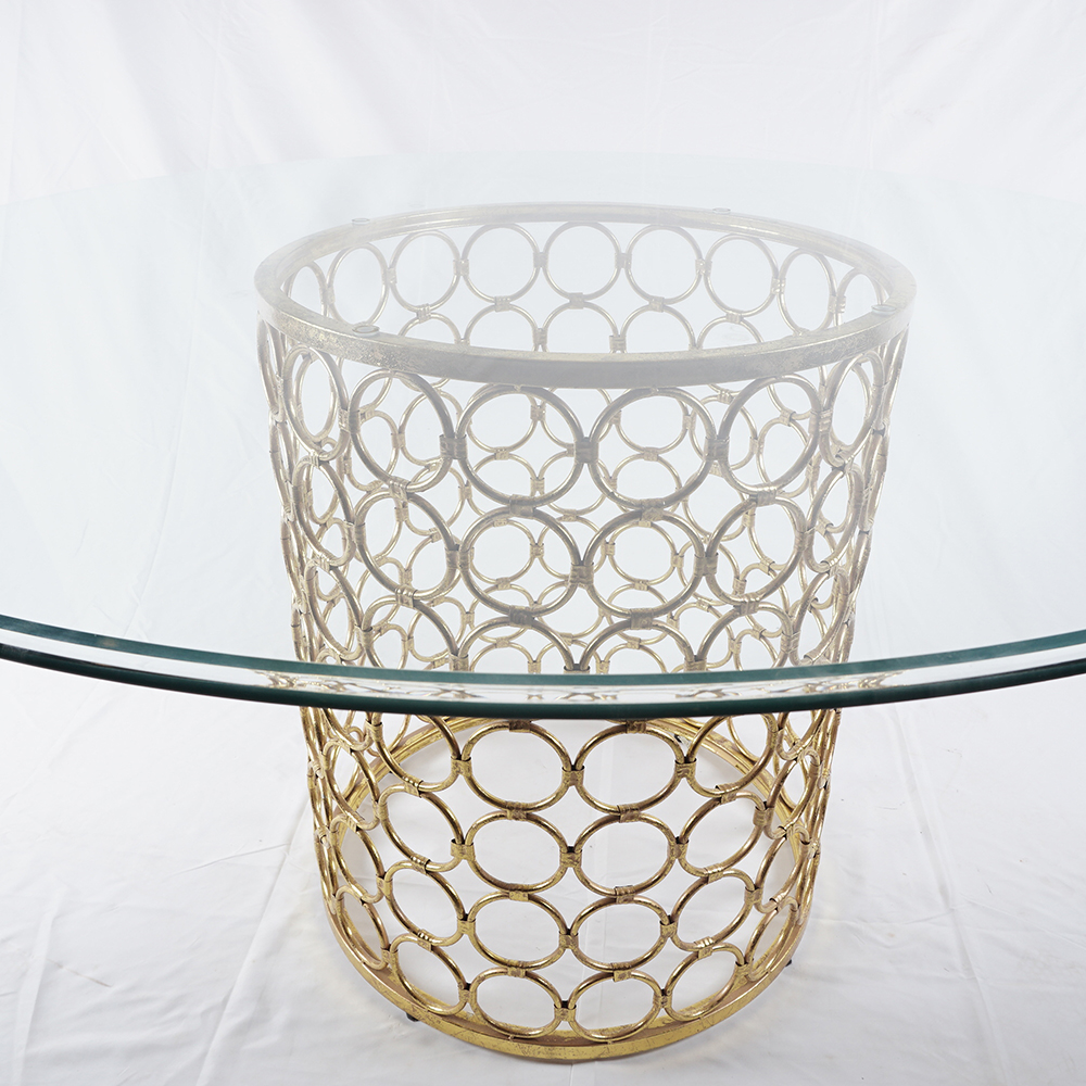 Circular Glass Dining Table with Perforated Brass Tone Pedestal