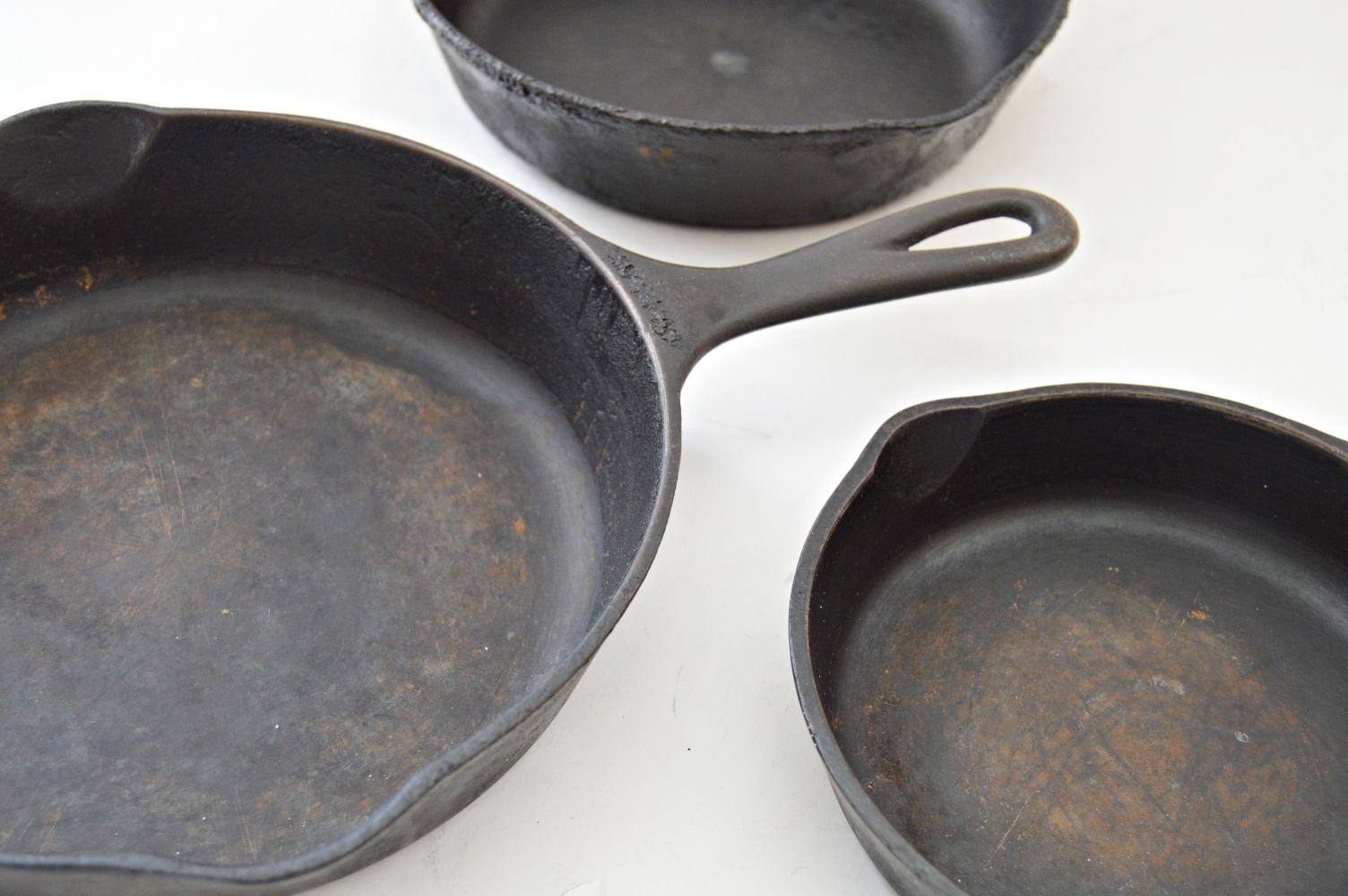 Three Cast Iron Skillets