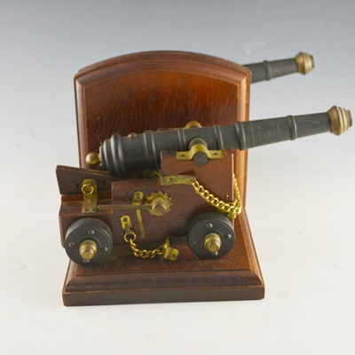 Pair of Canon Bookends and Matching Table Lamp