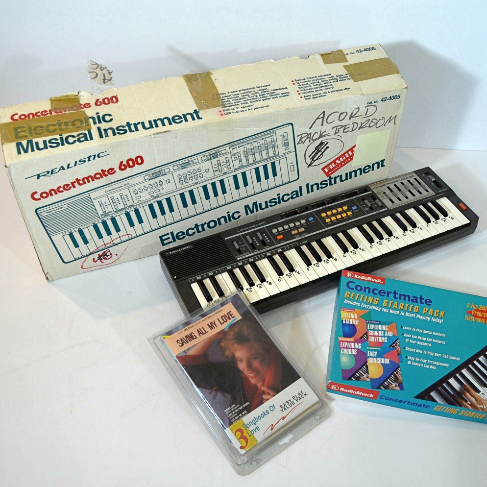 Realistic Electronic Keyboard and Instructional Books