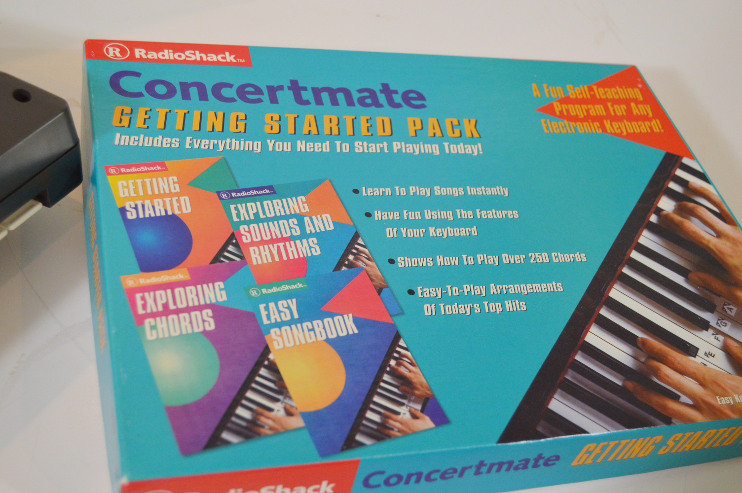 Realistic Electronic Keyboard and Instructional Books