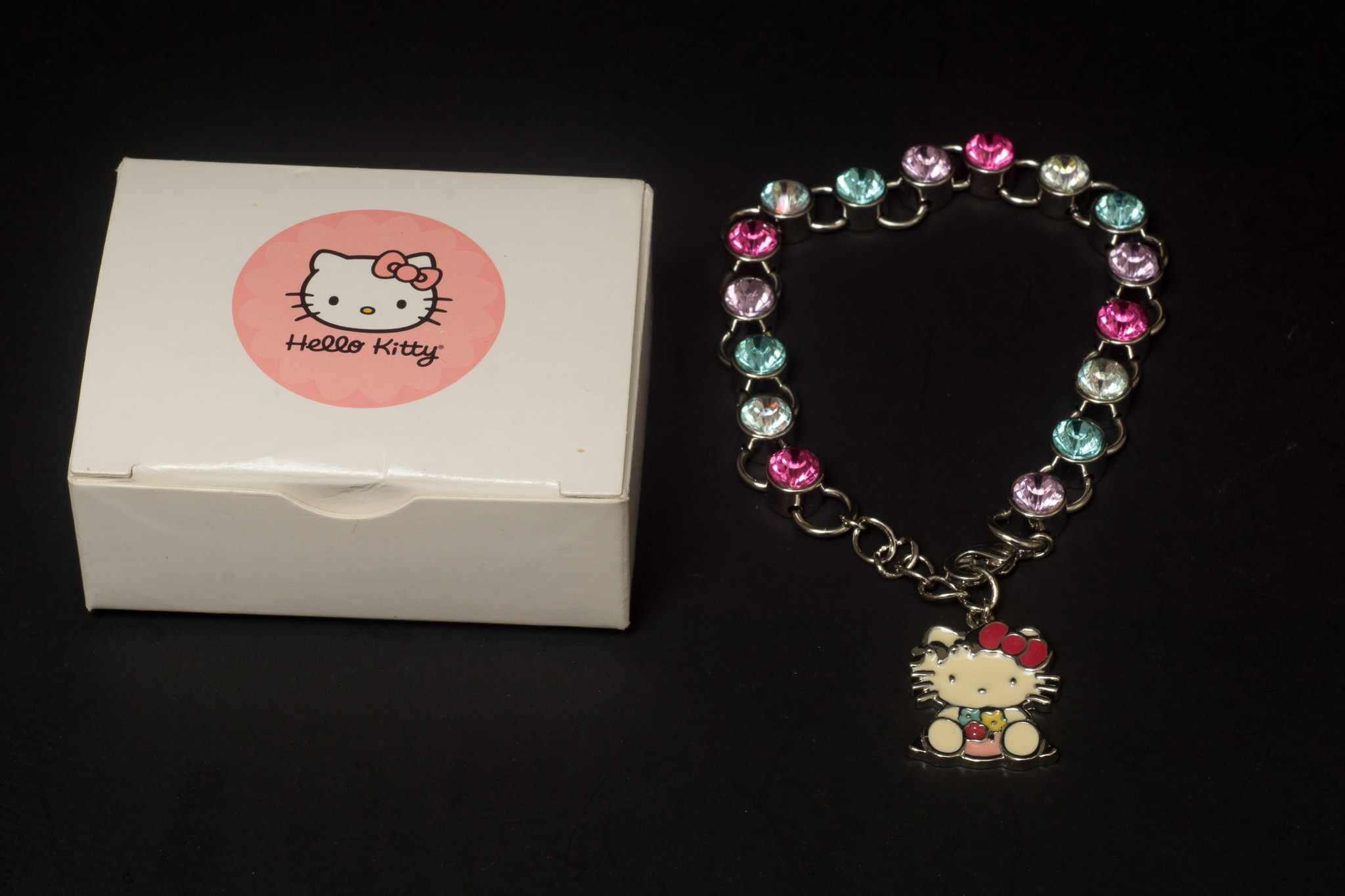 Pair of Disney Watches and a Hello Kitty Charm Bracelet