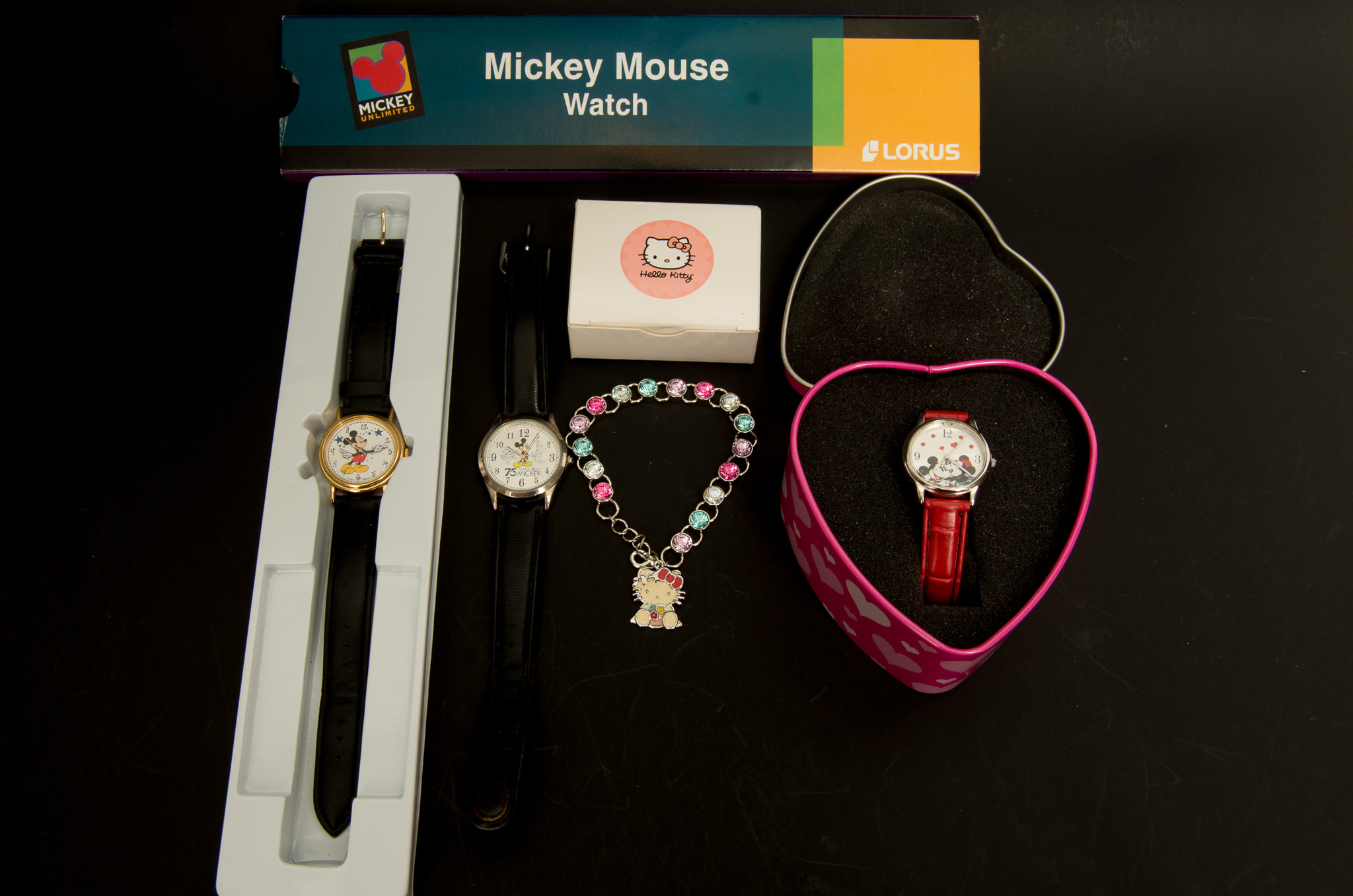 Pair of Disney Watches and a Hello Kitty Charm Bracelet