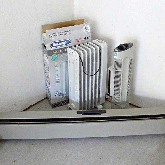 Two Portable Space Heaters and an Air Purifier
