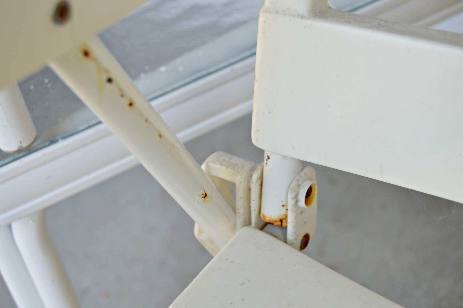 Pair of White Metal and Glass Top Patio Tables and Folding Chair